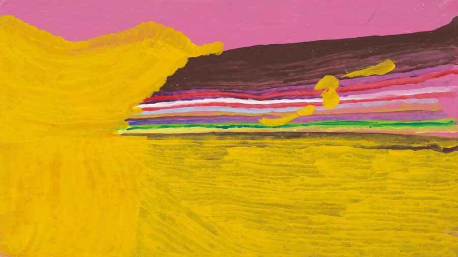 Es ist eine Landschaft mit vielen Farben zu sehen. Das Bild ist horizontal. Im Hintergrund ist eine grosse pinke Fläche dargestellt, wie eine Art Himmel. Im Vordergrund ist eine gelbe Fläche zu sehen, die sich von links über das ganze Bild ausbreitet. Diese Fläche könnten Berge oder ein Sandstrand darstellen.